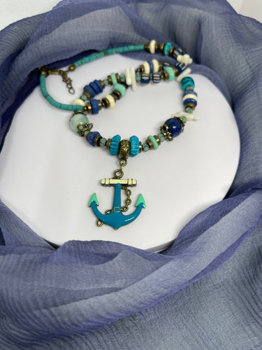 Strand Necklace with mixed material & anchor pendant